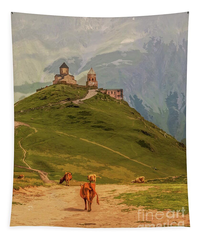 Monastery Tapestry featuring the digital art Cows grazing in mountains-Gergeti Trinity Church perched on moun by Susan Vineyard
