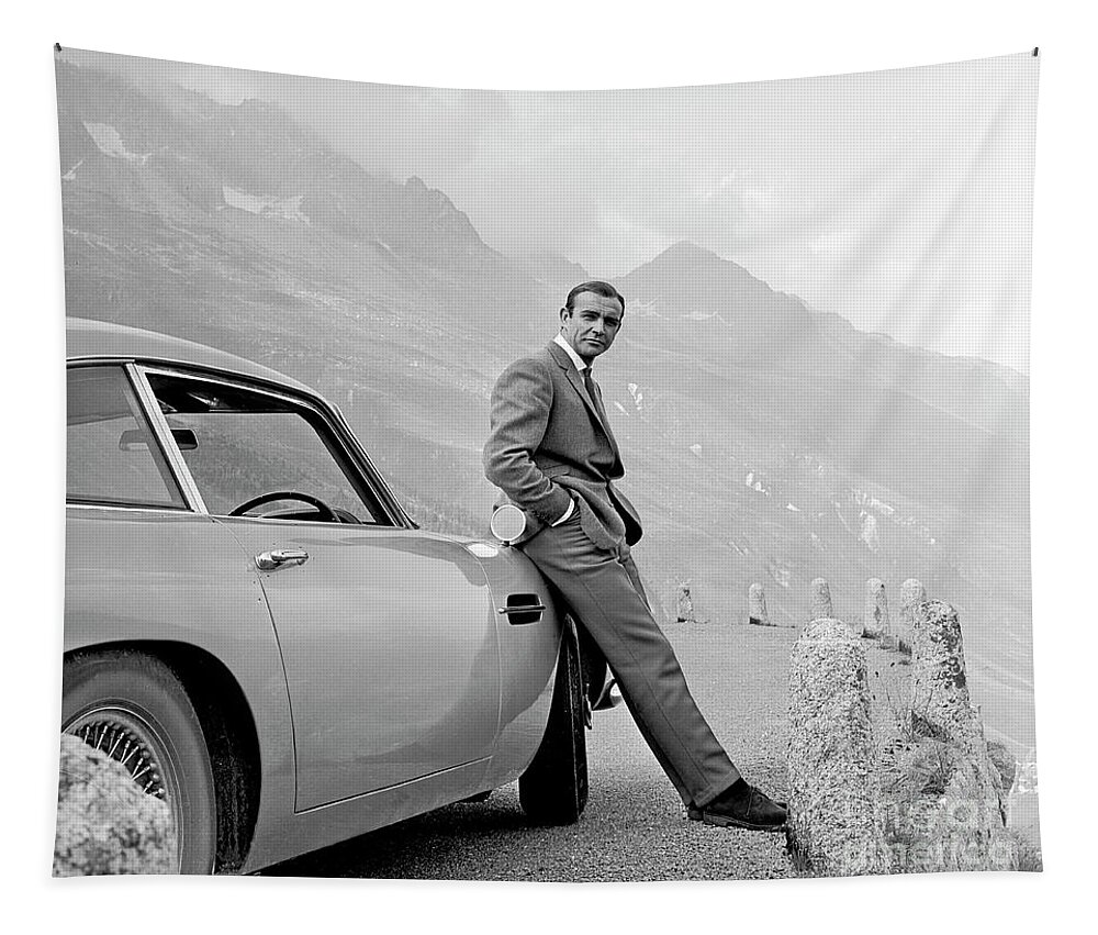 #faatoppicks Tapestry featuring the photograph James Bond Coolly Leaning on His Aston Martin by Doc Braham