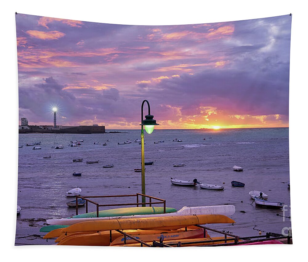 Light Tapestry featuring the photograph La Caleta Beach at Sunset Cadiz by Pablo Avanzini