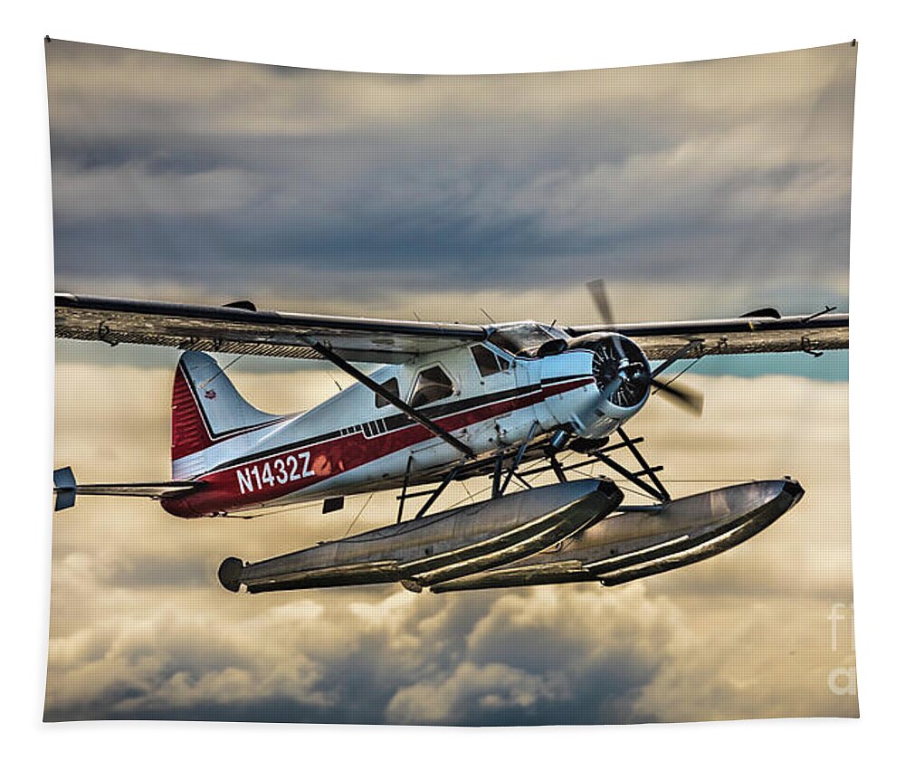 Seaplane Tapestry featuring the photograph Seaplane in the Anchorage sky by Lyl Dil Creations