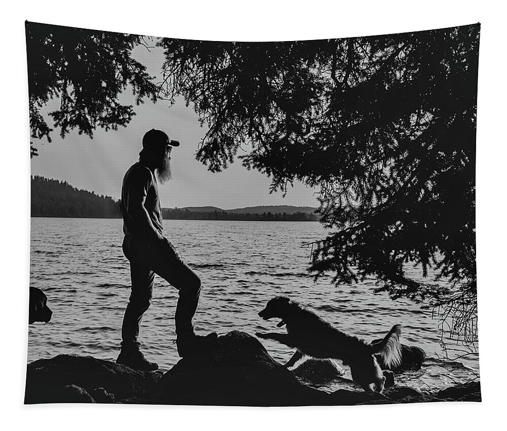 Dog Tapestry featuring the photograph Silhouette of dogs enjoying Half Moon Lake by Julieta Belmont
