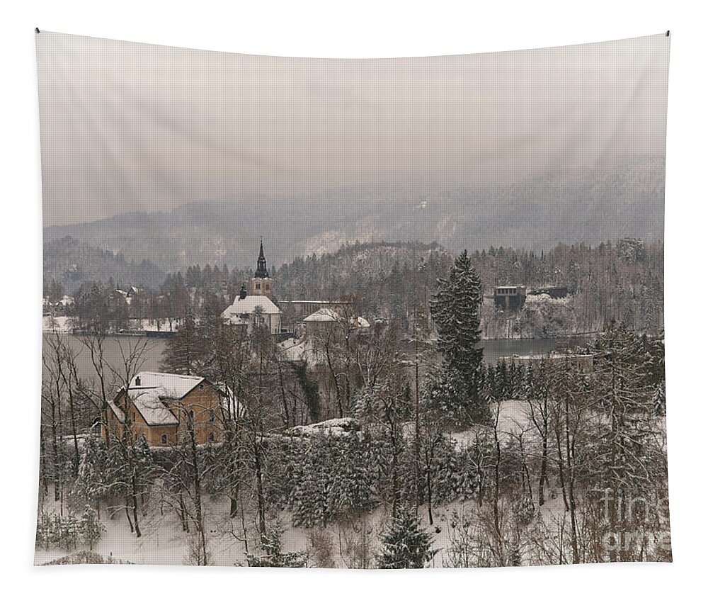 Christmas Tapestry featuring the photograph Snowy Bled In Slovenia by MSVRVisual Rawshutterbug