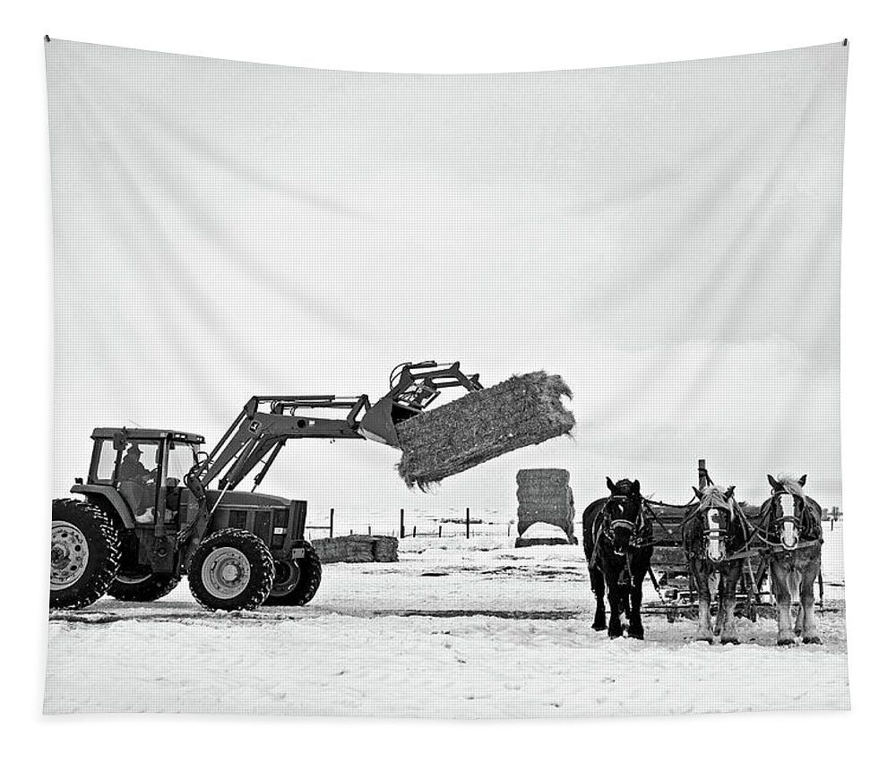 Ranch Tapestry featuring the photograph The new with the old Ranching in Wyoming tracktos with team of horses by Julieta Belmont