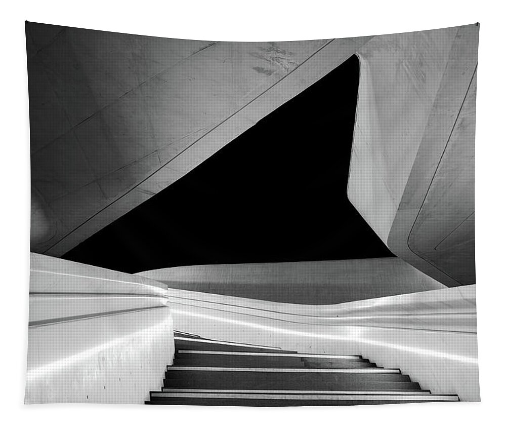 Futuristic Building Tapestry featuring the photograph Modern architecture and empty staircase leading to a bright open space. by Michalakis Ppalis