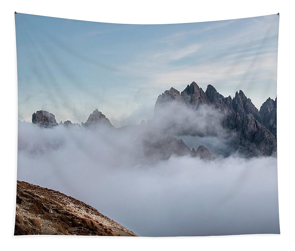 Italian Alps Tapestry featuring the photograph Mountain landscape with fog in autumn. Tre Cime dolomiti Italy. by Michalakis Ppalis