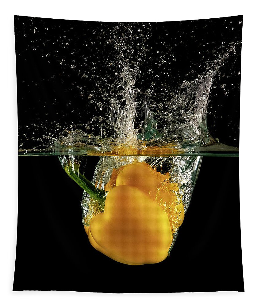 Pepper Tapestry featuring the photograph Yellow bell pepper dropped and slashing on water by Michalakis Ppalis