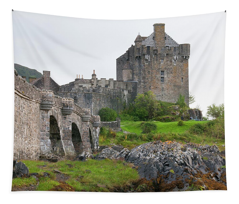 Scotland Tapestry featuring the photograph Eilean Donan Castle in the loch Alsh at the highlands of Scotlan by Michalakis Ppalis
