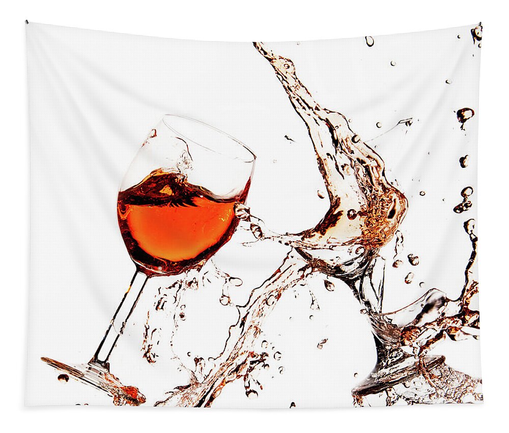 Damaged Tapestry featuring the photograph Broken wine glasses with wine splashes on a white background by Michalakis Ppalis