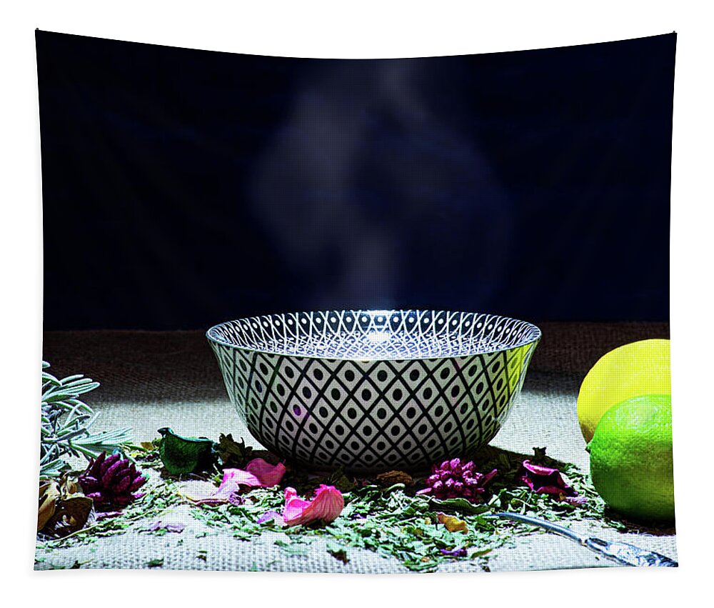 Tea Tapestry featuring the photograph A drinking bowl with tea and herbs. by Bernhard Schaffer
