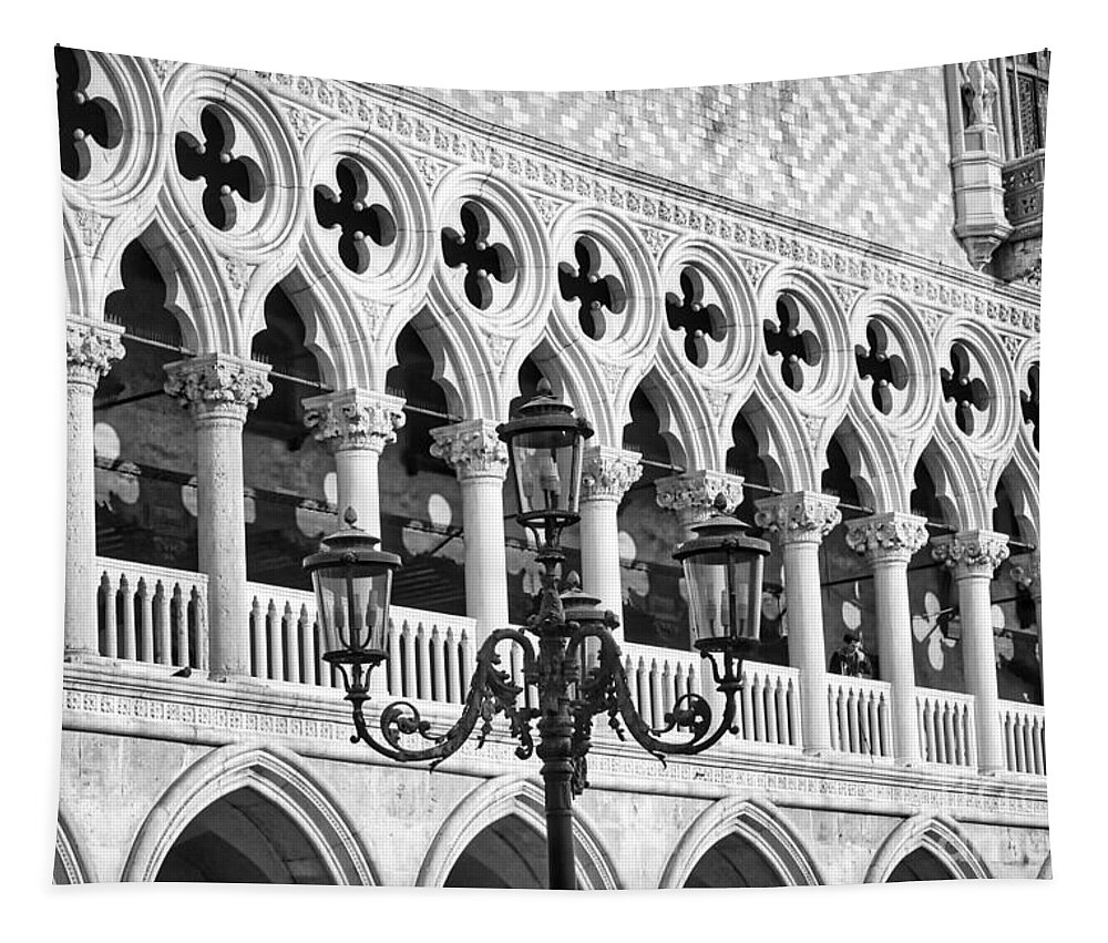 The Ducal Palace Tapestry featuring the photograph A typical Venetian street lamp in front of the Ducal Palace windows by Stefano Senise