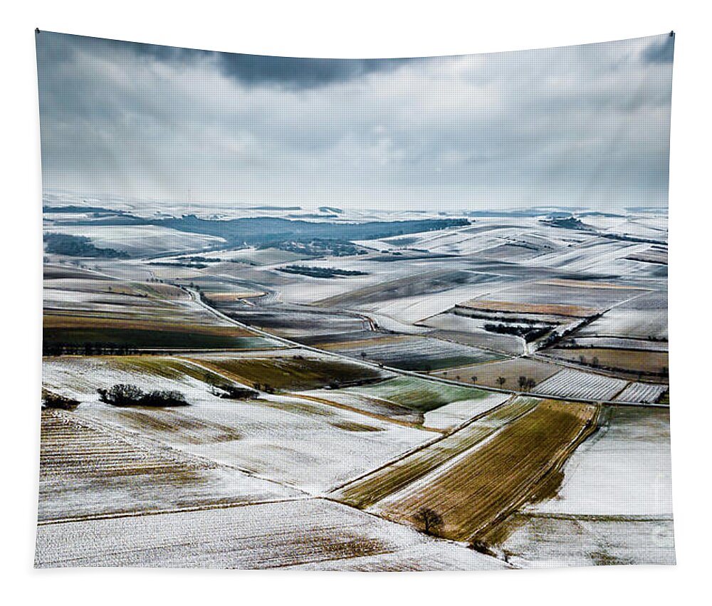 Above Tapestry featuring the photograph Aerial View Of Winter Landscape With Remote Settlements And Snow Covered Fields In Austria by Andreas Berthold
