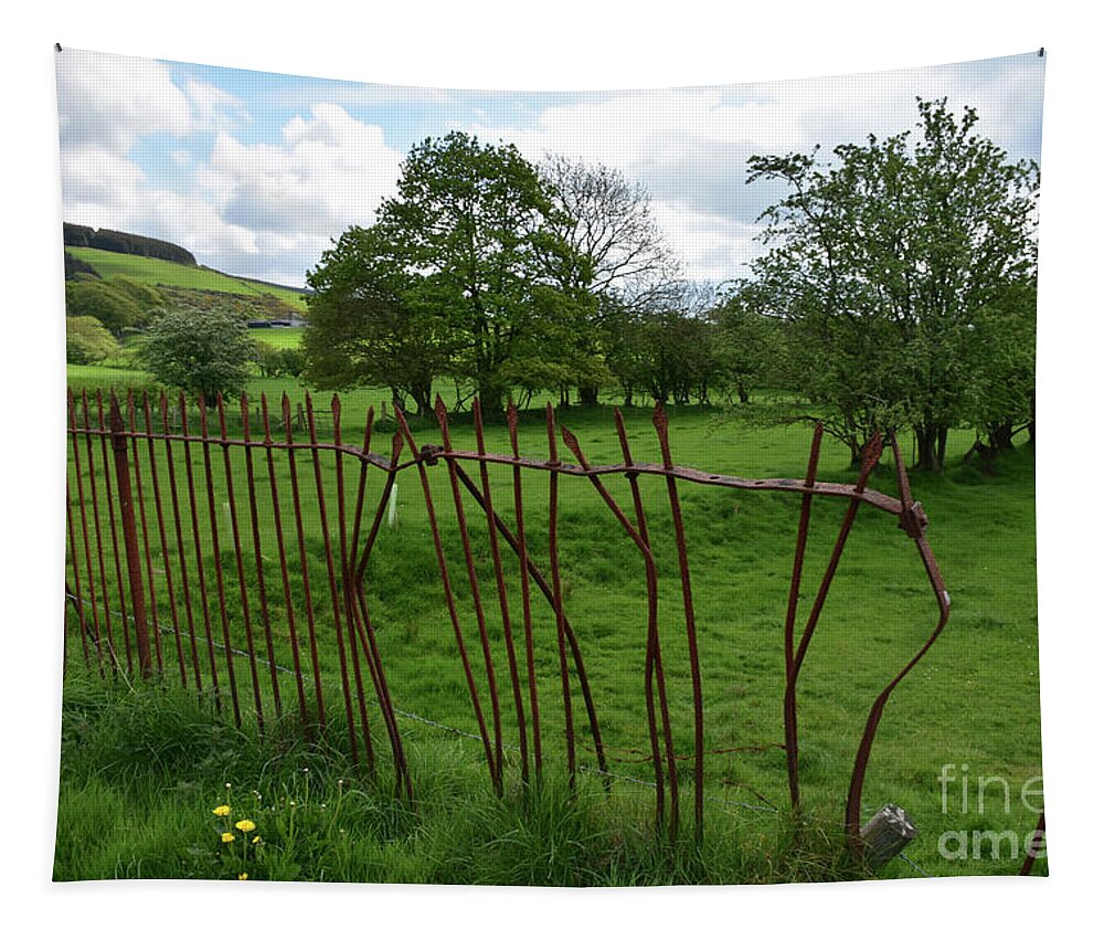 Farm Tapestry featuring the photograph Bent and Broken Iron Rod Fence Around a Field by DejaVu Designs