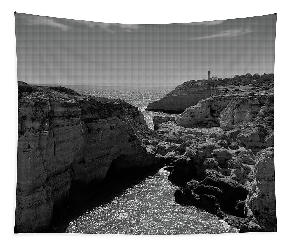 Algarve Tapestry featuring the photograph Carvoeiro lighthouse and cliffs by Angelo DeVal