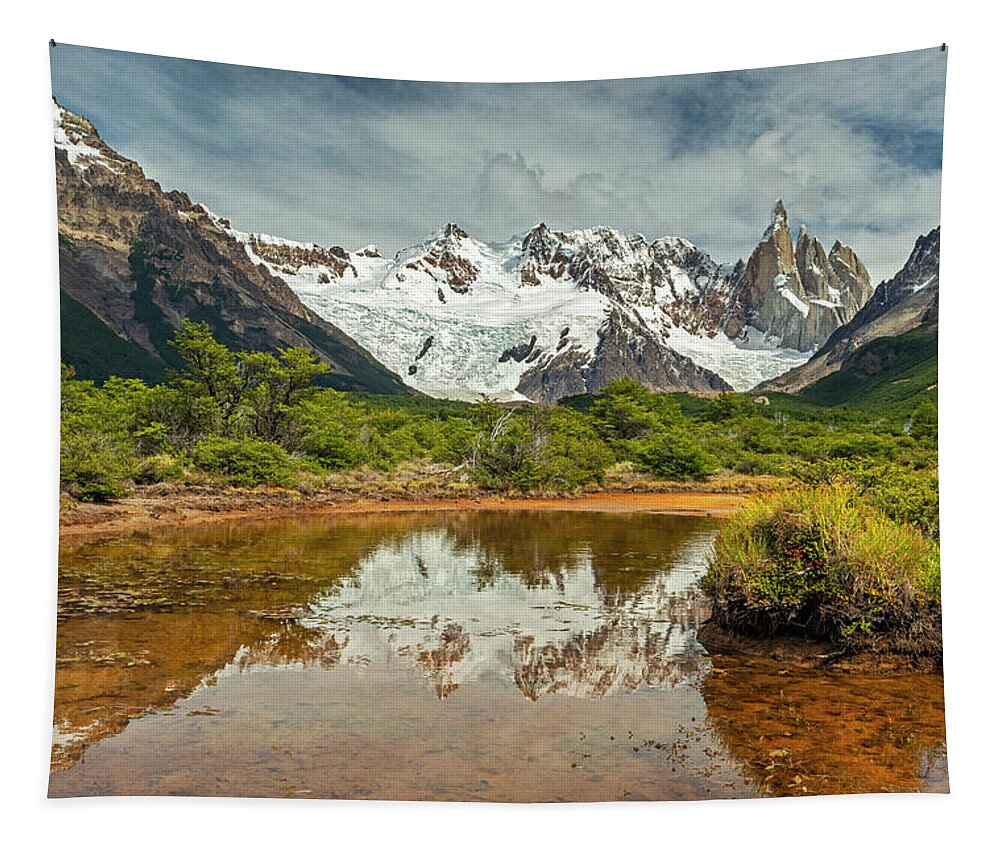 Andes Tapestry featuring the photograph Cerro Torre reflecting in a pond by Henri Leduc