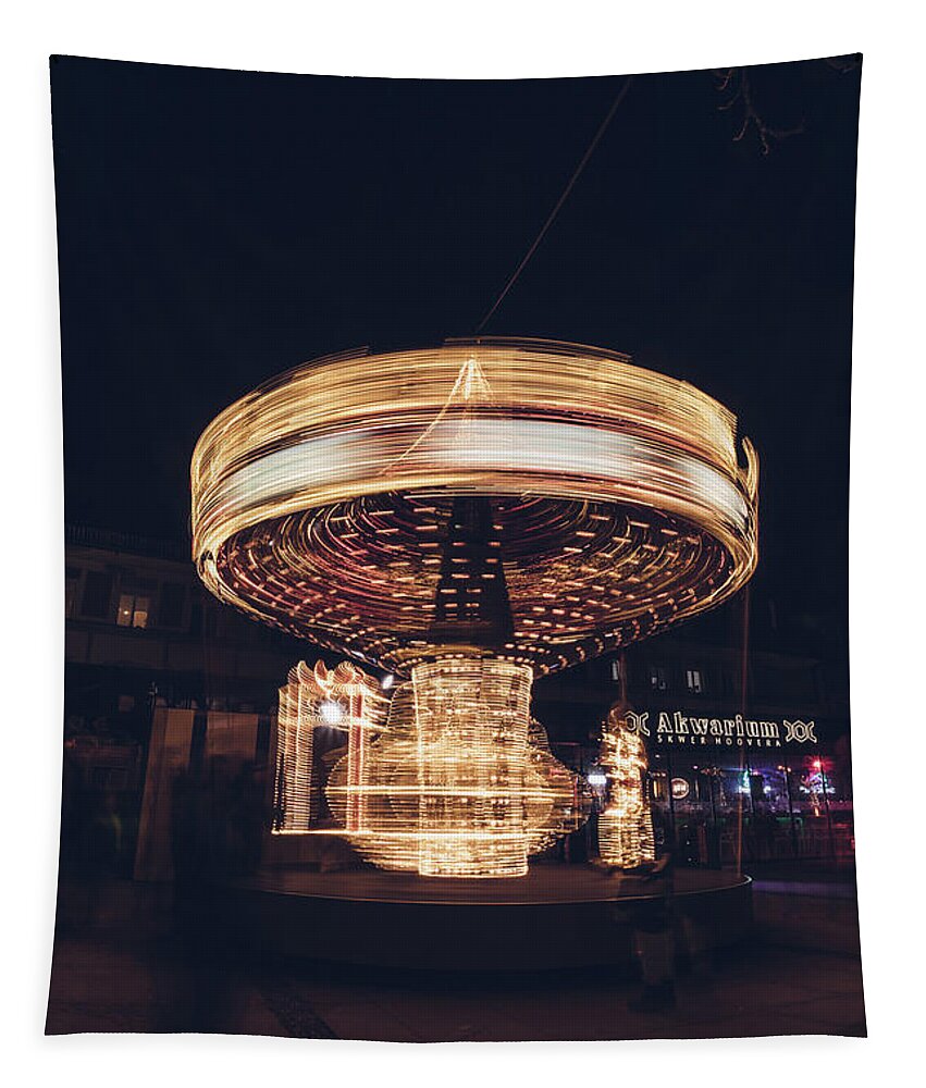 Illuminations Tapestry featuring the photograph Christmas carousel on the streets of Warsaw. Fire Wheel by Vaclav Sonnek