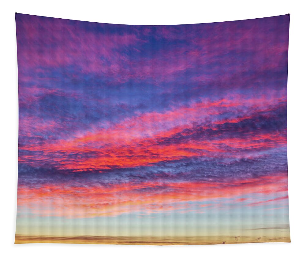 Sunset Tapestry featuring the photograph Colorful cloudscape at sunset by Fabiano Di Paolo