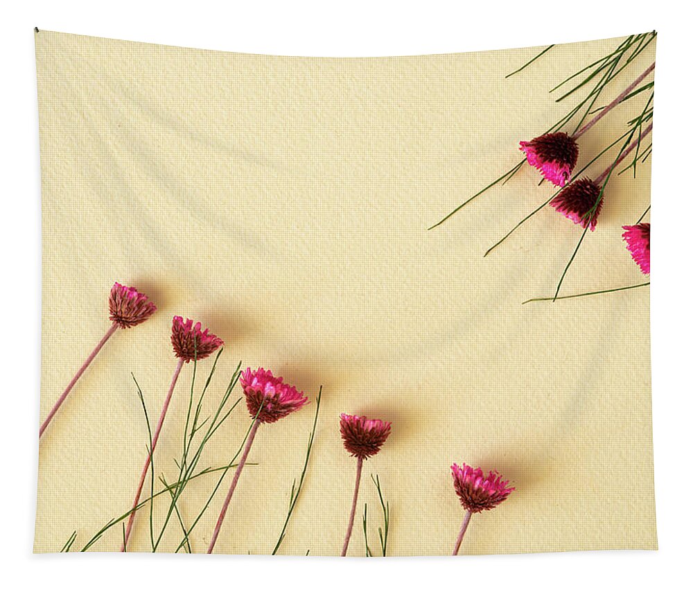 Dry Flowers Tapestry featuring the photograph Dry purple floral bouquet on yellow background. Flat lay, top vi by Michalakis Ppalis