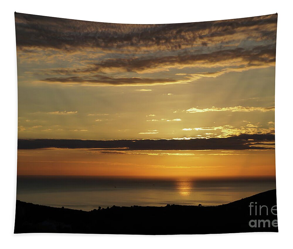 Clouds Tapestry featuring the photograph Golden sunrise over the sea by Adriana Mueller