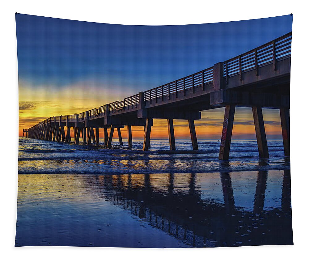 Jacksonville Beach Tapestry featuring the photograph Golden Sunrise Reflection at the Jacksonville Beach Pier by Kim Seng