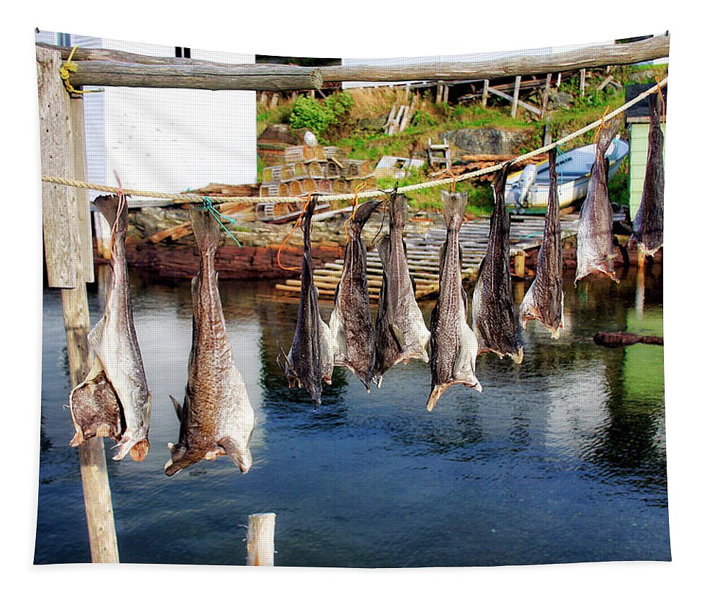 Fish Tapestry featuring the photograph Hanging fish to dry in Salvage Newfoundland by Tatiana Travelways
