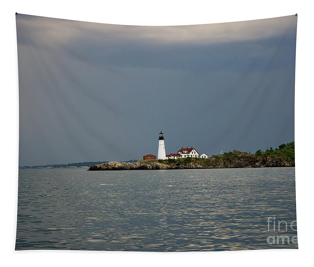 Portland Headlight Tapestry featuring the pyrography Lighthouse before the storm by Annamaria Frost