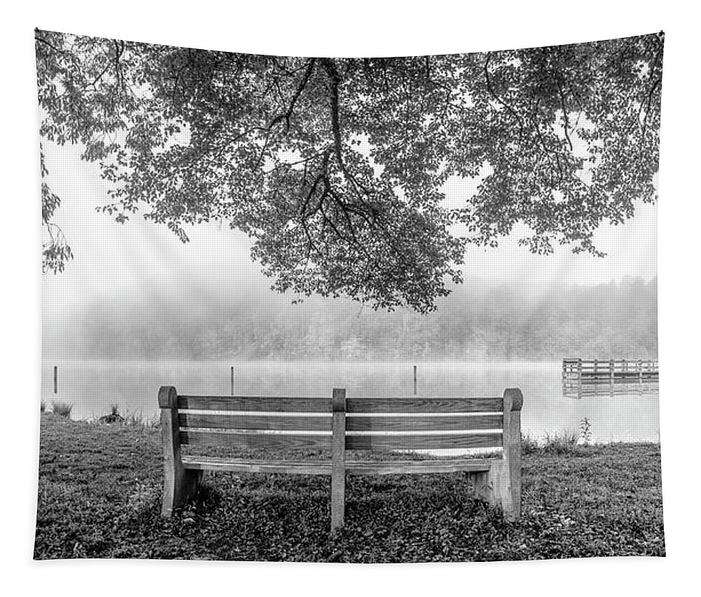 Black Tapestry featuring the photograph Lone Bench at the Lake Black and White by Debra and Dave Vanderlaan