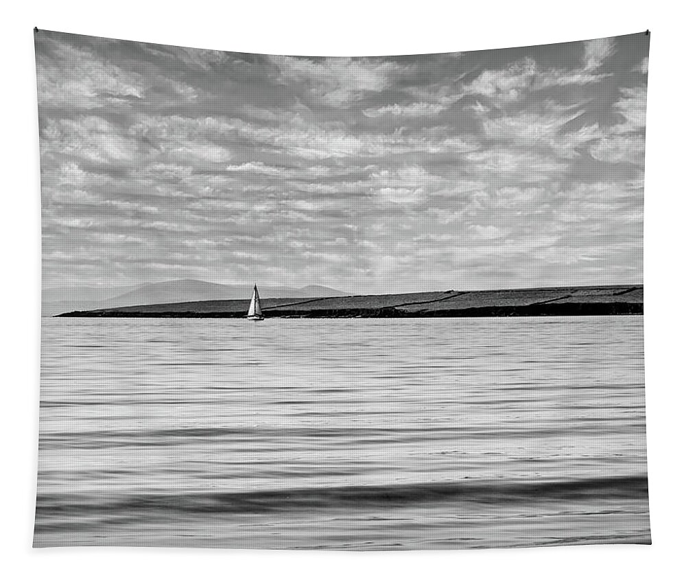 Boats Tapestry featuring the photograph Lone White Sailboat in Ireland in Black and White by Debra and Dave Vanderlaan