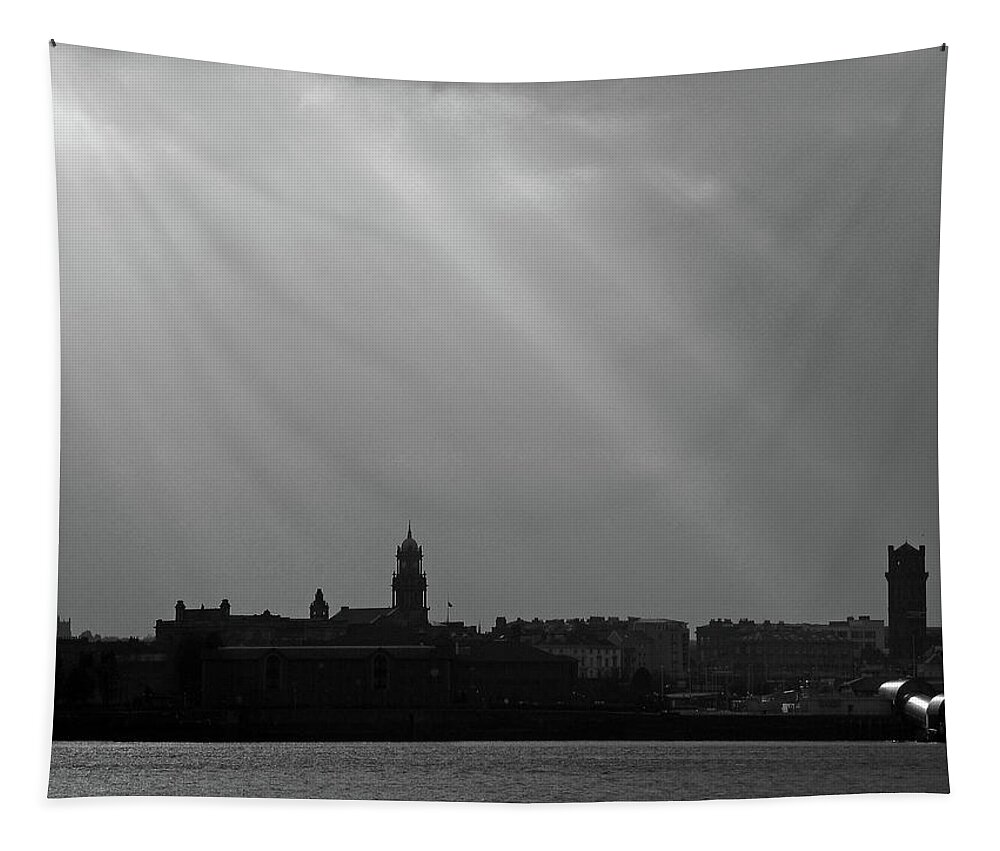 Liverpool; River Mersey; Black And White; Landscape; Cityscape; Skyline; Great Britain; Merseyside; Wirral Birkenhead; Sunbeams; Silhouette; Sky; Clouds; England; Tapestry featuring the photograph Mersey Sunbeams by Lachlan Main