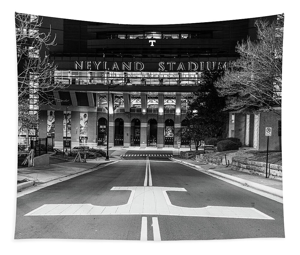 University Of Tennessee At Night Tapestry featuring the photograph Neyland Stadium at the University of Tennessee at night in black and white by Eldon McGraw