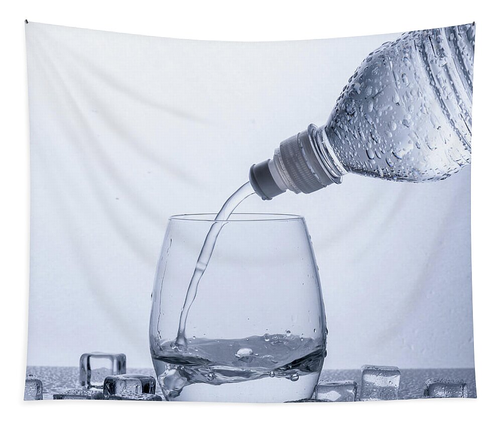 Water Tapestry featuring the photograph Pouring water in glass by Jelena Jovanovic