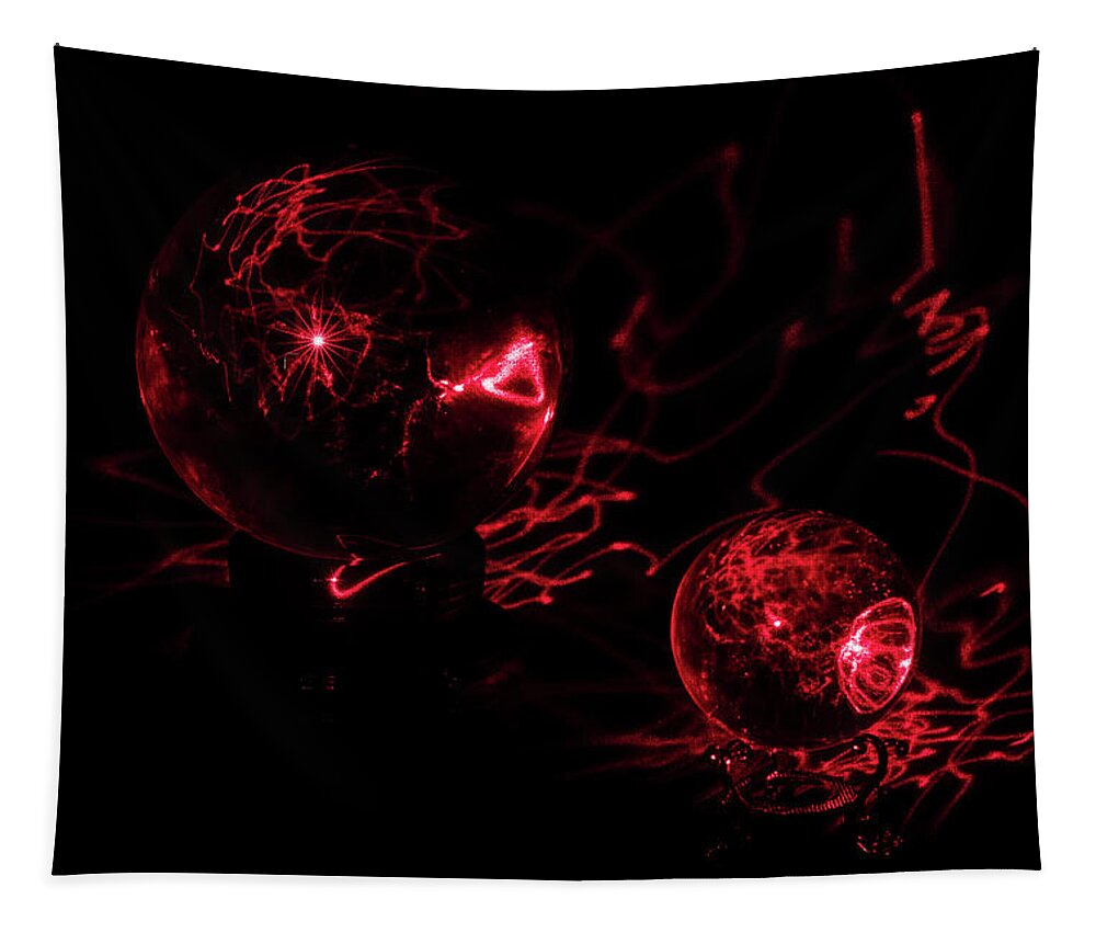 North Carolina (nc) Tapestry featuring the photograph Red Laser Interacts with Two Crystal Balls by Charles Floyd