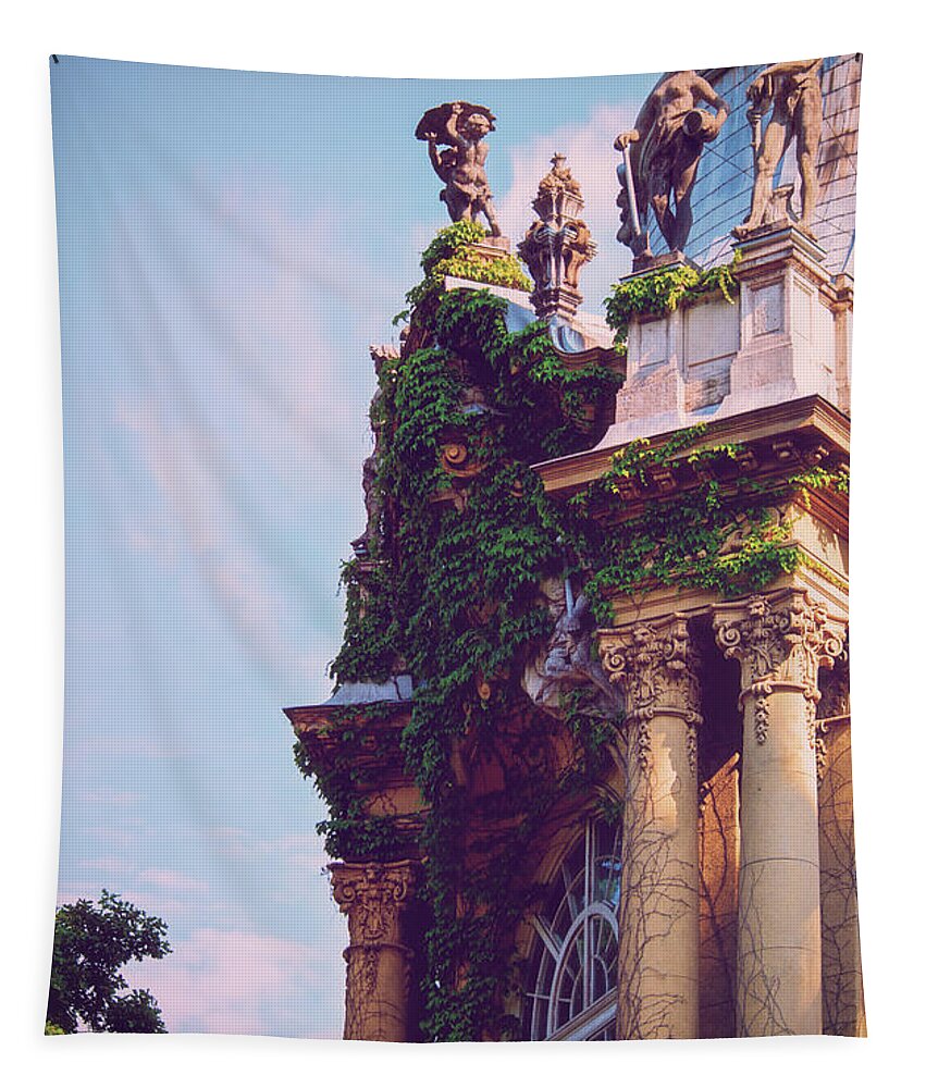 Castle Tapestry featuring the photograph Side view of the pillars and sculptures of Vajdahunyad Castle by Mendelex Photography