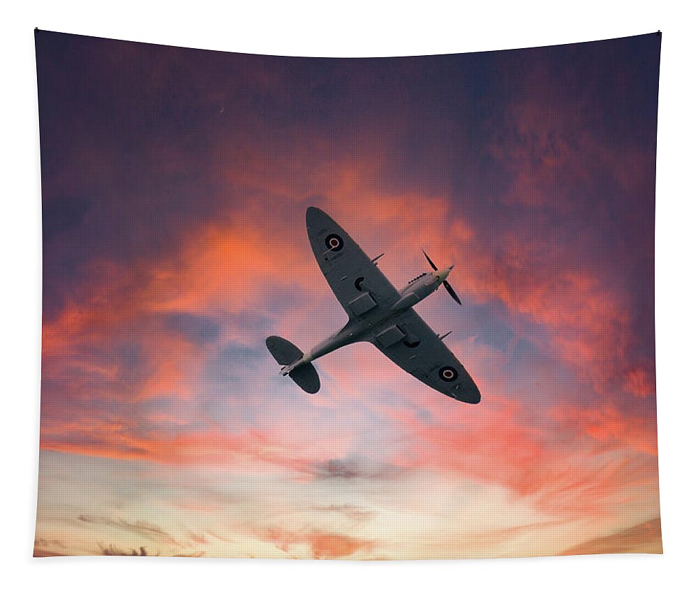 Eastbourne International Airshow Tapestry featuring the photograph Spitfire flying at sunset by Andrew Lalchan