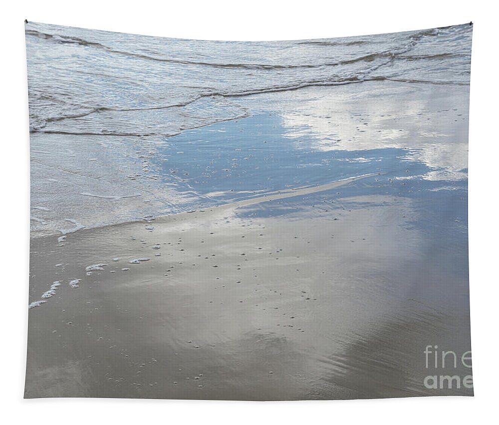 Sea Water Tapestry featuring the photograph Subtle waves and reflection in the wet sand by Adriana Mueller