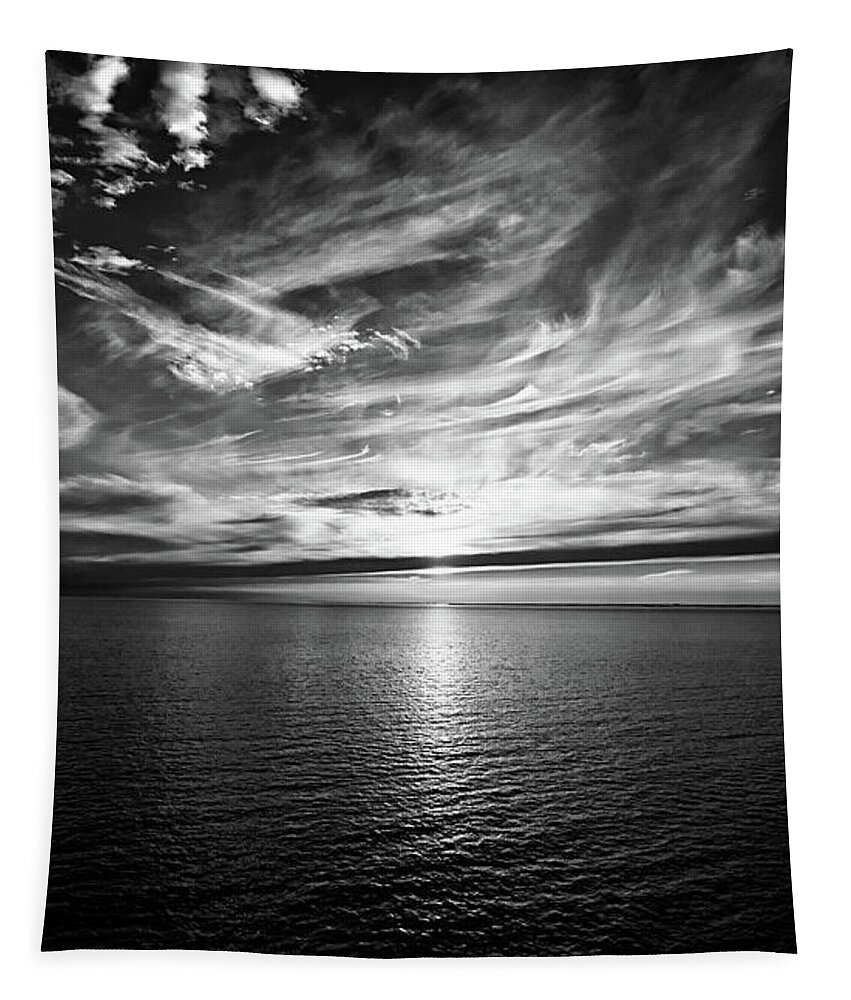 Sunset Tapestry featuring the photograph Sunset on the horizon at sea by Bernhard Schaffer