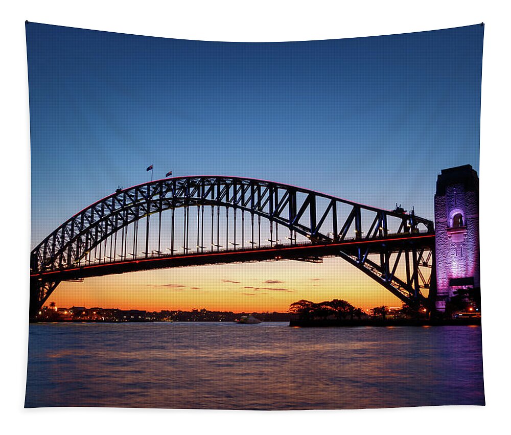 Arch Tapestry featuring the photograph Sydney Harbour Bridge illuminated at sunset by Rick Deacon