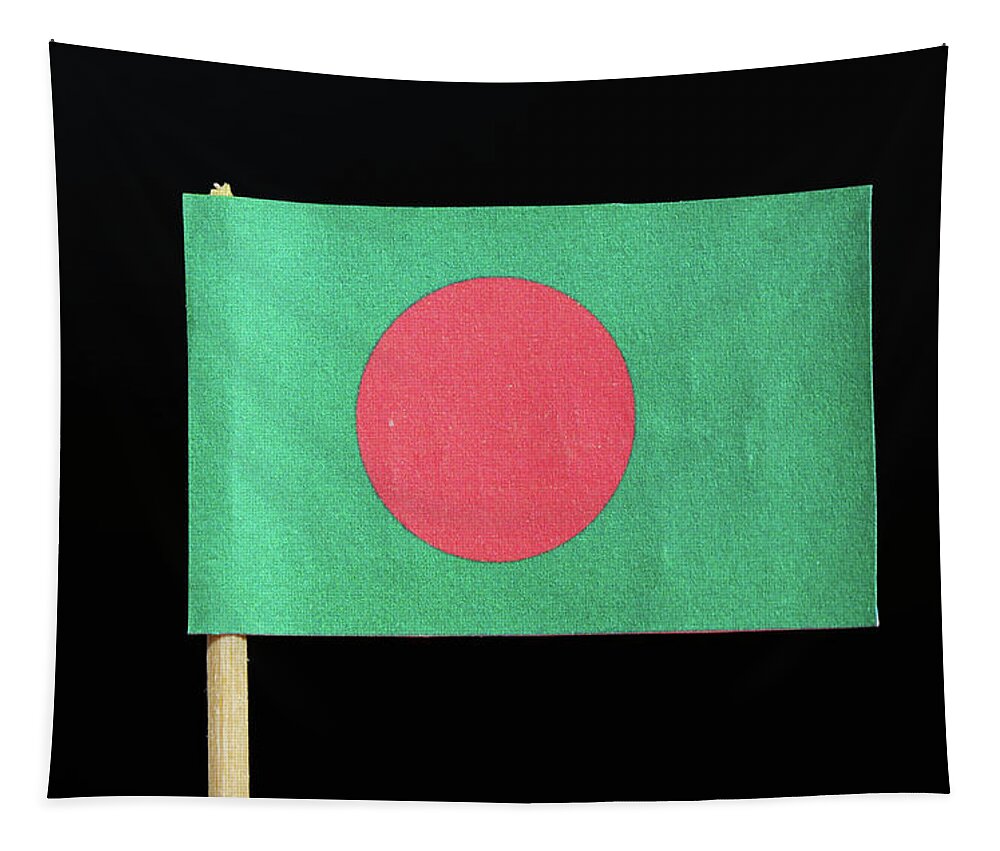  Bangladesh Tapestry featuring the photograph The national flag of Bangladesh on toothpick on black background. A red disc on a green field by Vaclav Sonnek