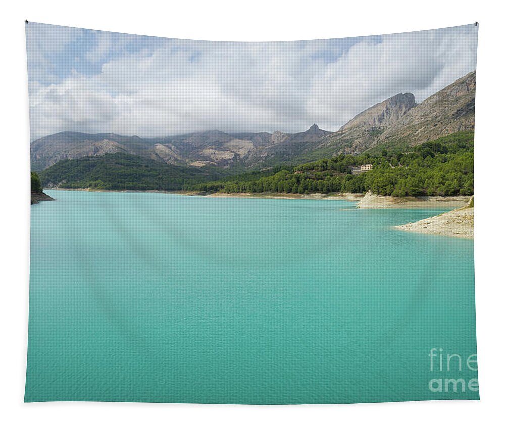 Guadalest Tapestry featuring the photograph Turquoise blue water and mountain landscape by Adriana Mueller