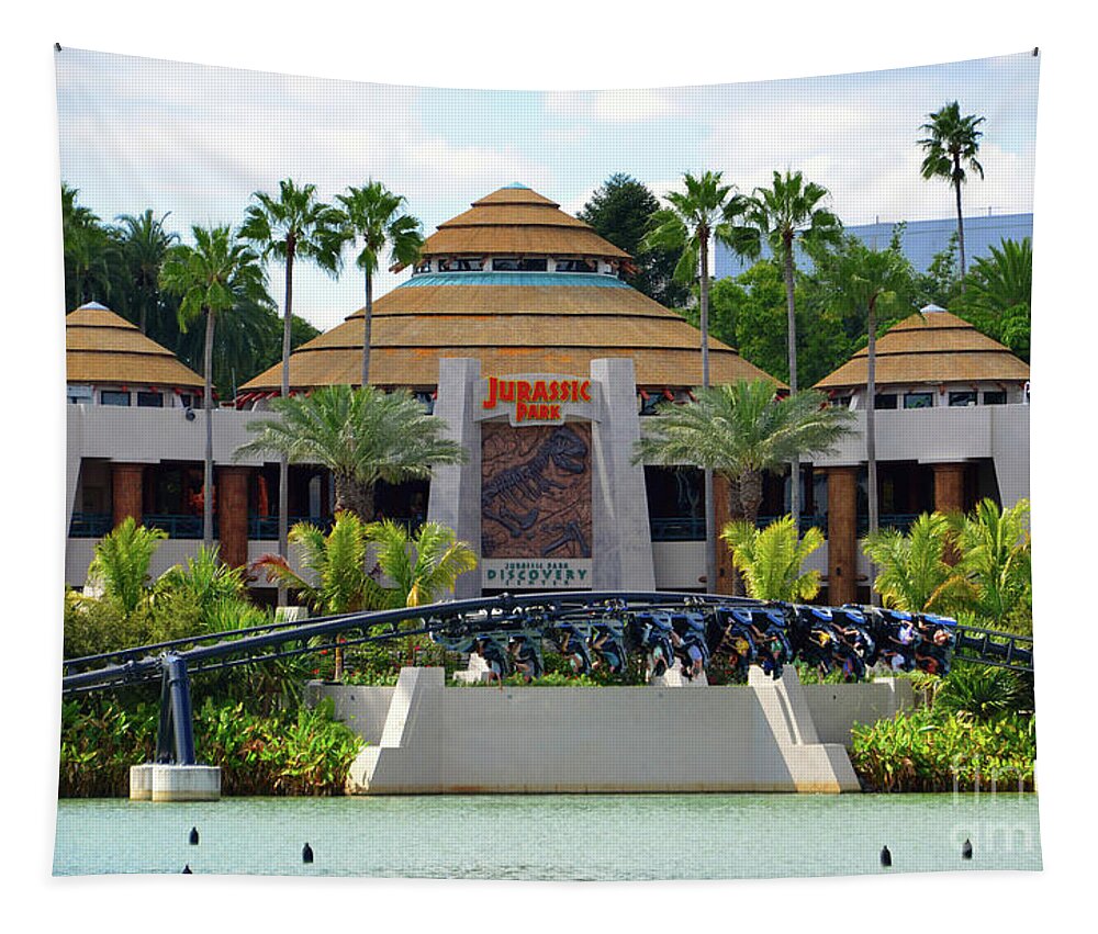  Universals Islands Of Adventure Tapestry featuring the photograph Velocicoaster and Discovery Center by David Lee Thompson