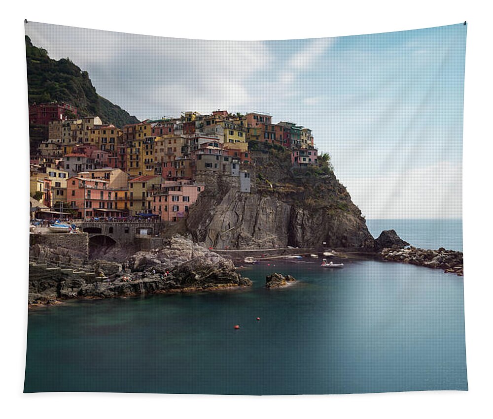 Cinque Terre Tapestry featuring the photograph Village of Manarola with colourful houses at the edge of the cliff Riomaggiore, Cinque Terre, Liguria, Italy by Michalakis Ppalis