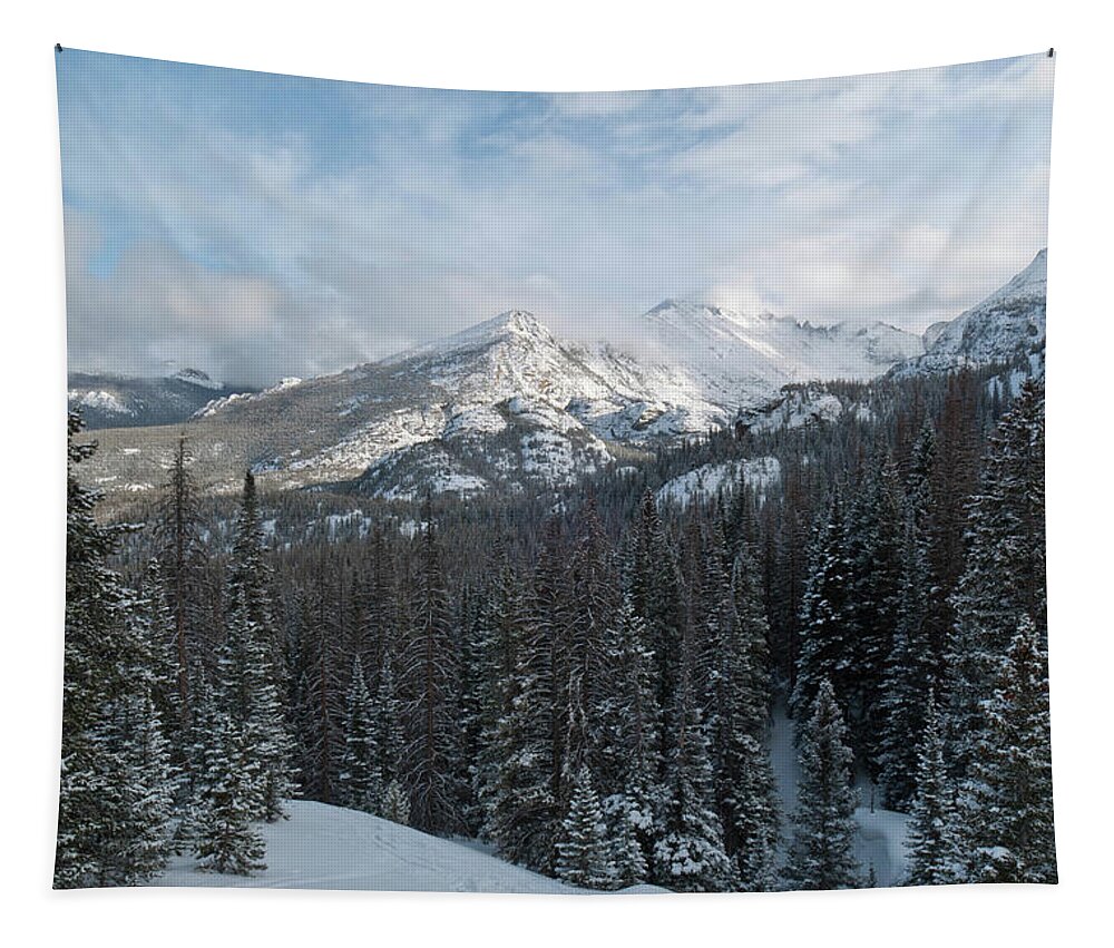 Long's Peak Tapestry featuring the photograph Winter Clouds Lifting Above Long's Peak by Cascade Colors