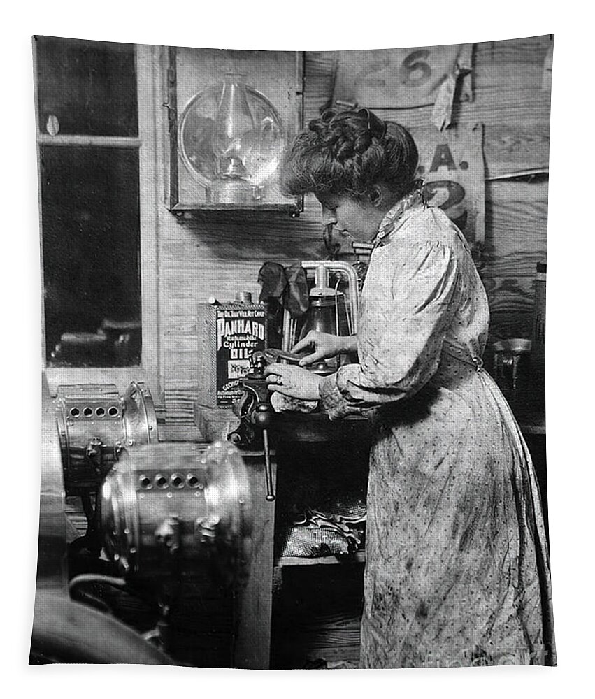 1910 Tapestry featuring the photograph Woman polishing early vehicle headlamps 1910 by Retrographs