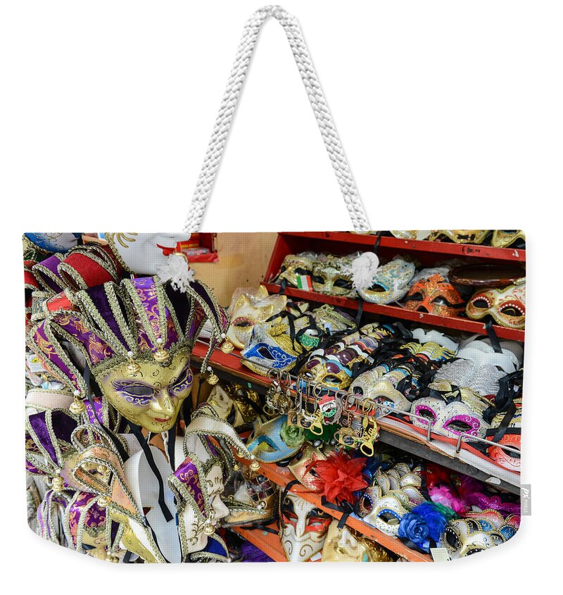 Art Weekender Tote Bag featuring the photograph Vintage Venetian carnival masks for sale in Venice Italy by Brandon Bourdages