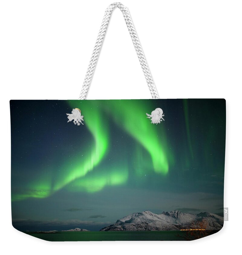 Extreme Terrain Weekender Tote Bag featuring the photograph Aurora Borealis In Arctic Norway #1 by Antonyspencer