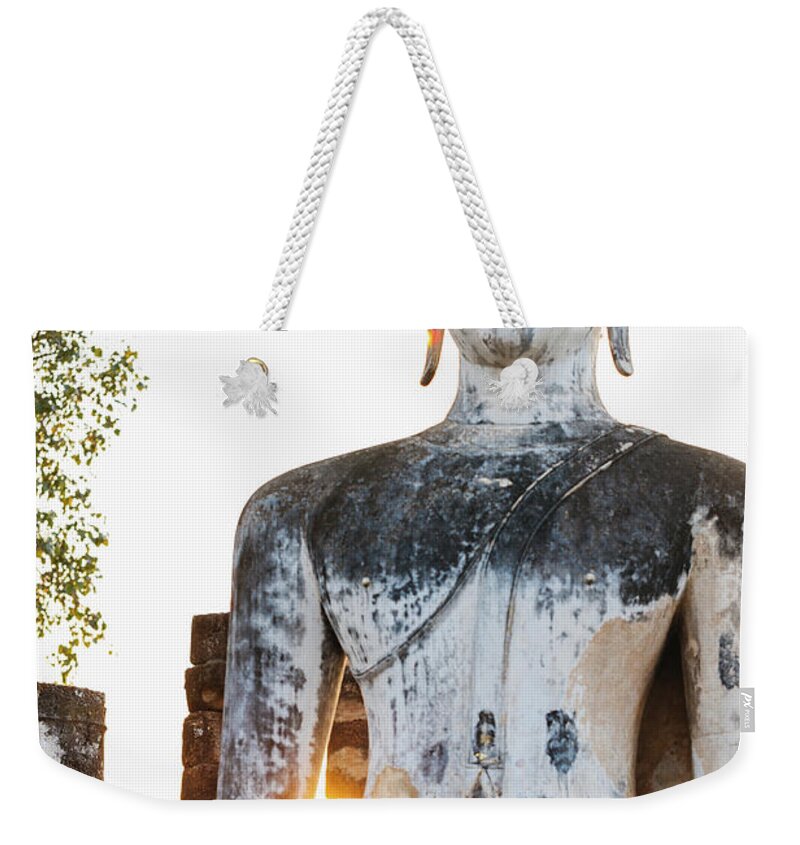 Statue Weekender Tote Bag featuring the photograph Buddha Statue In Sukhothai, Thailand #1 by Deimagine