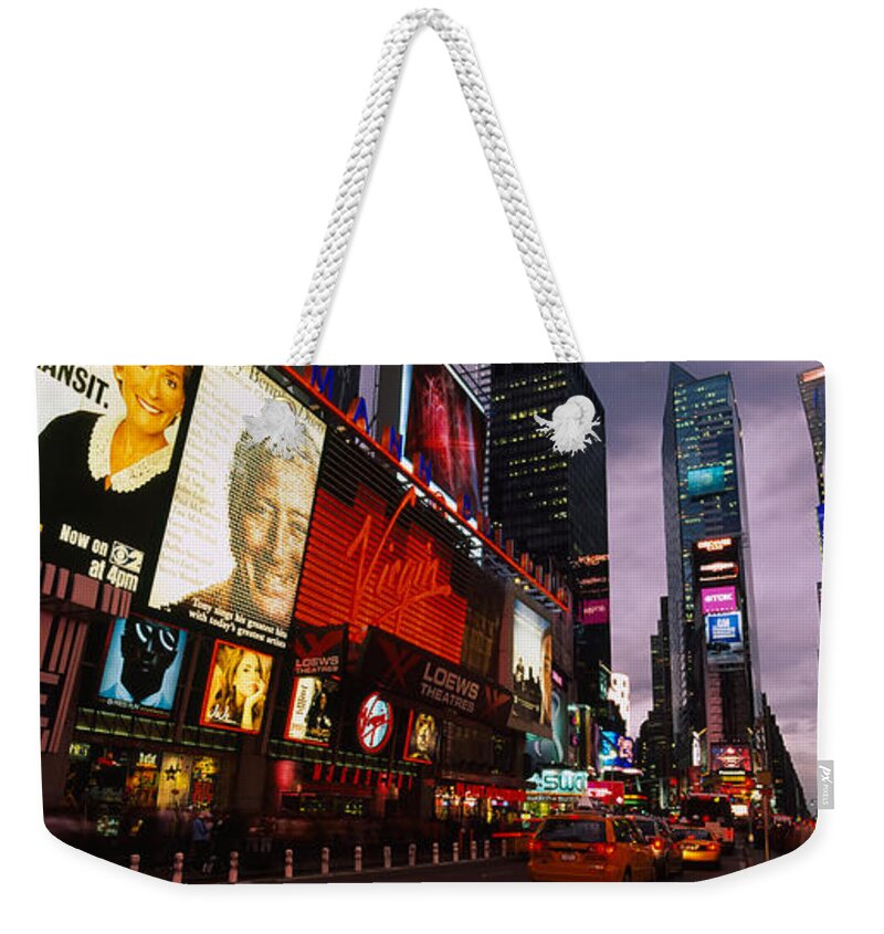 Photography Weekender Tote Bag featuring the photograph Buildings Lit Up At Night, Times #1 by Panoramic Images