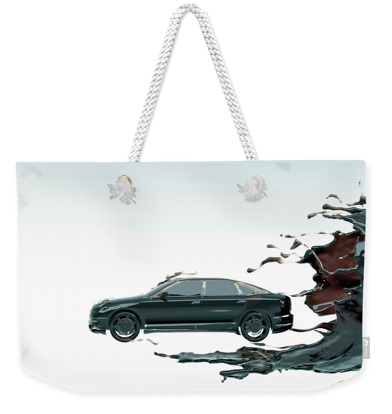 Artificial Weekender Tote Bag featuring the photograph Cgi Car Emerging From Crude Oil Vortex #1 by Coneyl Jay