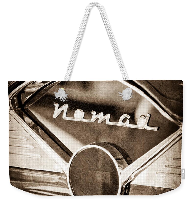 Chevrolet Belair Nomad Dashboard Emblem Weekender Tote Bag featuring the photograph Chevrolet Belair Nomad Dashboard Emblem #1 by Jill Reger