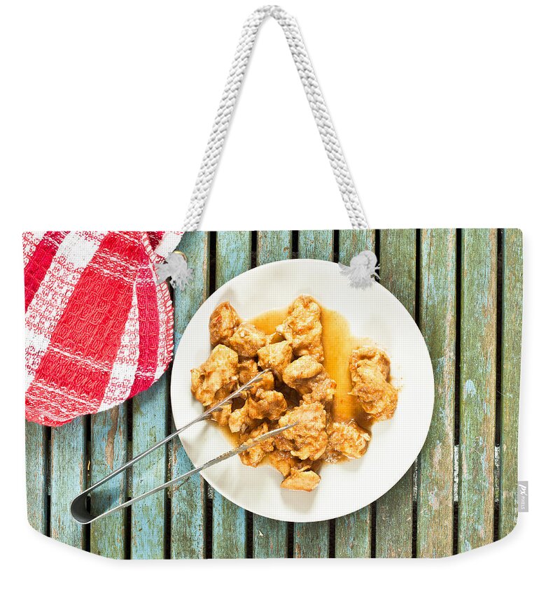 Background Weekender Tote Bag featuring the photograph Chicken meal #1 by Tom Gowanlock