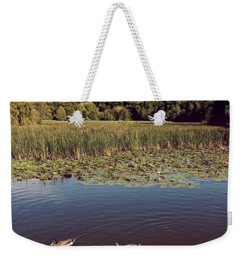 Beauty Weekender Tote Bag featuring the photograph Ducks #1 by Les Cunliffe